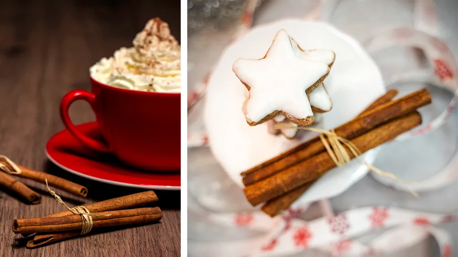 Red cup with cream, cinnamon sticks and Christmas cookies.