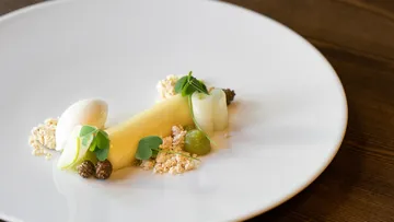 A plate of artfully prepared, fresh dessert.