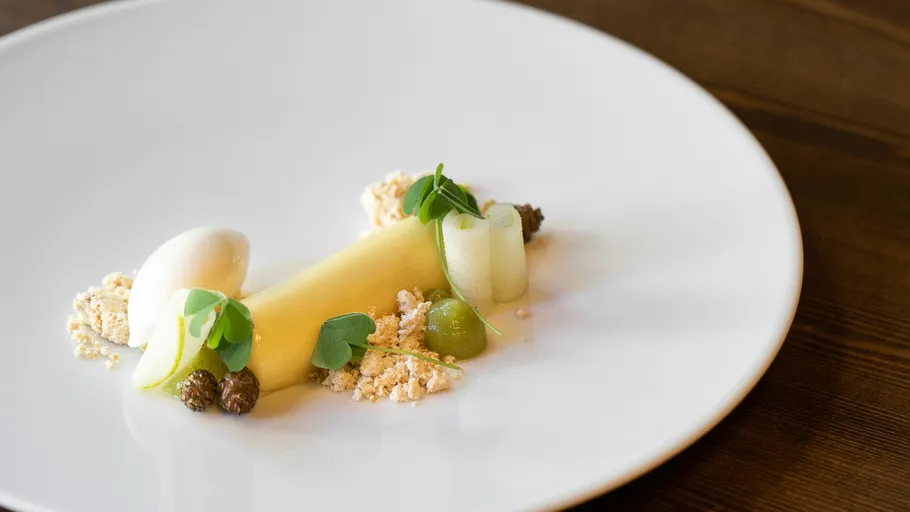 A plate of artfully prepared, fresh dessert.