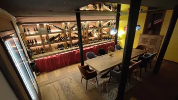 A table is placed in a cozy, illuminated room.