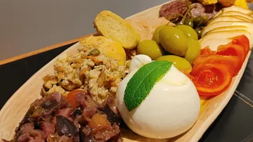Different dishes on one plate, deliciously arranged.