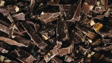 Crushed chocolate is messy on a table.