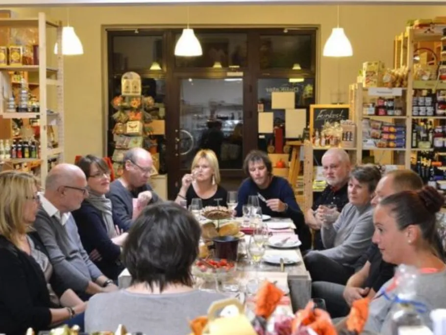 Round table with speakers in a grocery store.