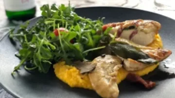 Chicken and polenta served with fresh salad.