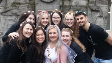 Group photo of friends celebrating a bachelorette party.