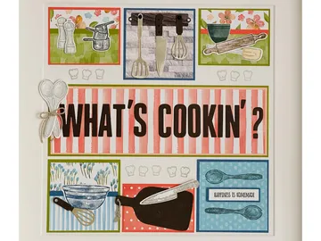 Kitchen appliances and utensils are creatively arranged, font above.