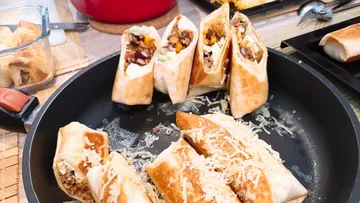 Tortillas with filling, fry in a pan, kitchen.