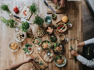 Various ingredients are prepared on a table.