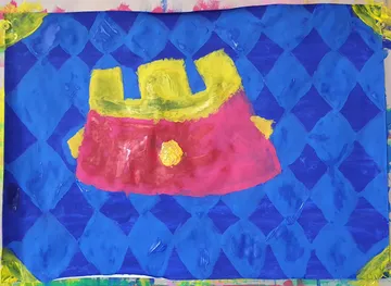 Farbenfrohes Bild eines einfachen Prinzenkostüms auf blauem Hintergrund.