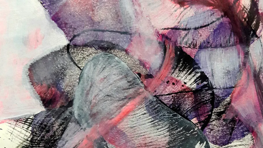 Abstract colors and shapes mix on a canvas.