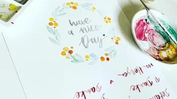 Wasserfarbengemälde mit dem Text „have a nice day“.