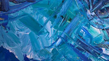 Blue and green brushstrokes form an abstract painting.