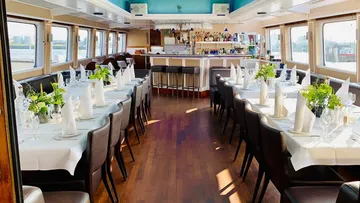 Elegant dining setup in a boat restaurant.