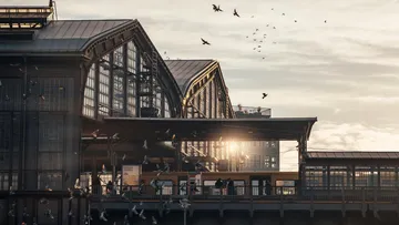 Bahnhof mit Vogelbewegungen, Sonnenlicht im Hintergrund.