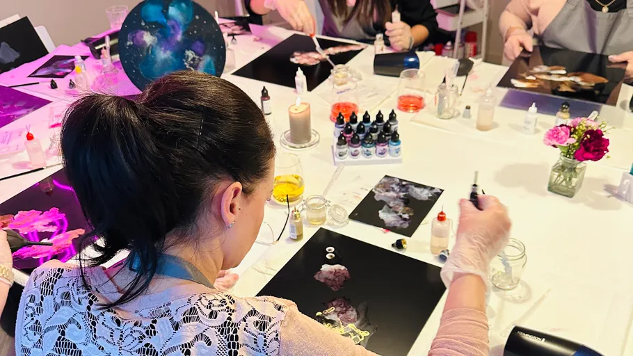 Table with creative art activities and colorful materials.