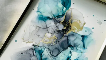 Abstract art: Fluid, colorful shapes on a light background.