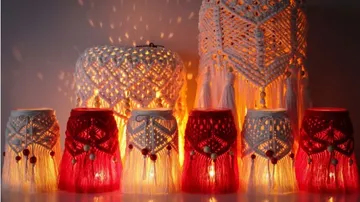 Macrame lamps glow softly in a warm environment.