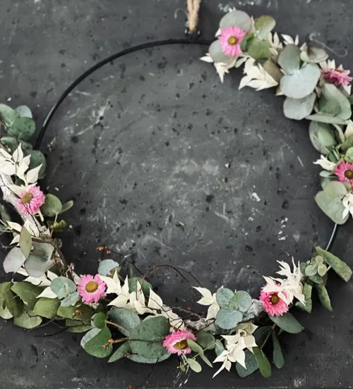 Cycle of dried flowers on a black background.