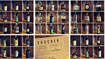 Bottles are on shelves, vouchers are next to them.