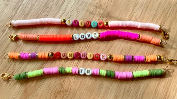 Colored bracelets with letters and decorative beads, recliners.