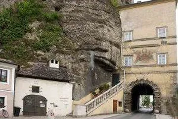 Rocks, buildings and roads combine historic architecture and nature.