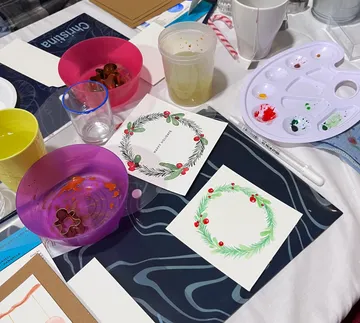 Colourful bowls and brushes to make Christmas cards
