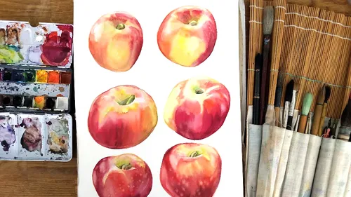 Sechs Äpfel werden auf Papier mit Wasserfarben dargestellt.