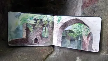 Sketch of old ruins with plants lying outdoors.