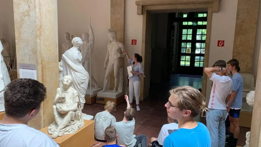 Sculpture in the museum, group tour about ancient art.