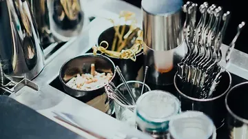 Accessories in a bar cart ready to mix drinks