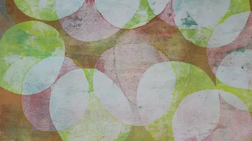 Colourful, overlapping circles on a textured background
