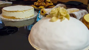 Cakes and pastries on a table ready to serve.