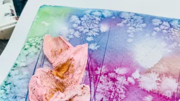 Color and texture on paper; floral design and colors.