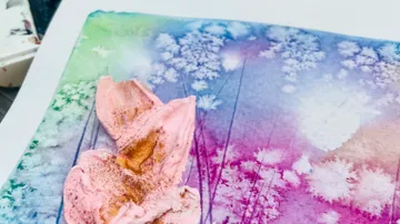 Colourful watercolor painting with a pink texture.