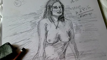 A naked woman stands while she is being drawn.