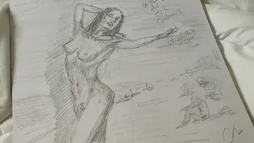 Nude drawing of a naked woman on a beach, relaxed setting.