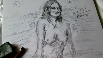 Sketch of a woman standing naked on paper surrounded by pencils.