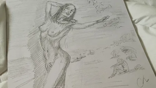 A naked woman poses on a beach surrounded by shadows.