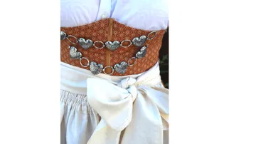 Corset with heart-shaped jewelry and wide white belt
