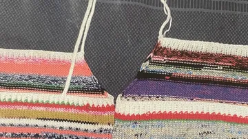 Multicolored stitched pieces with 'Bad Idea' text.