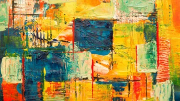 Bunte Farbschichten bilden ein abstraktes gemaltes Kunstwerk.
