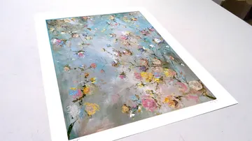 Colorful floral painting on flat surface.