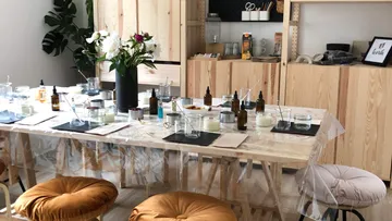 A table with various containers in a modern space.