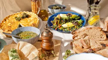 There are various foods and drinks on the table.