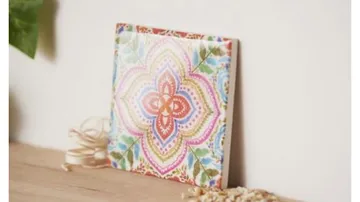 A brightly painted tile