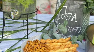 Cool drinks provided, snacks decorated on a table.