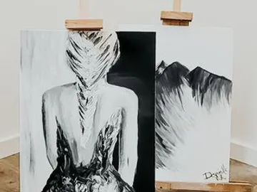 Two paintings stand on easels in a room.
