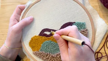 Stickmuster mit den Händen, Stanznadel