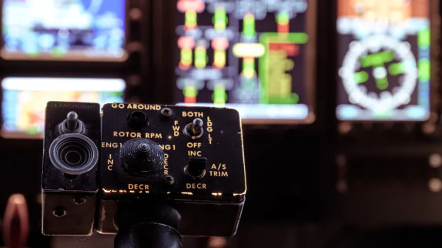 A control button controls functions in a cockpit.