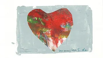 Heart made of bright colors on a gray background.